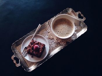 High angle view of coffee cup on table