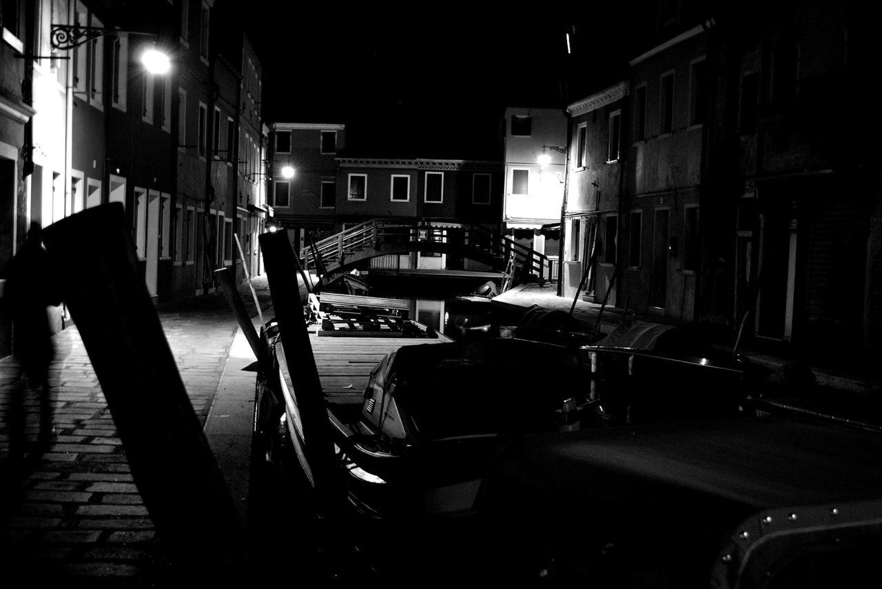 ILLUMINATED CARS ON CITY AT NIGHT