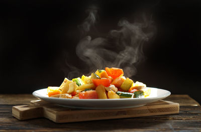 Close-up of vegetables in plate on table