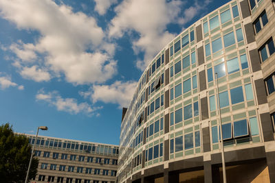 Low angle view of modern building against sky