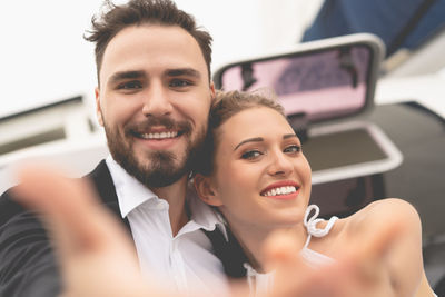 Portrait of a smiling young couple