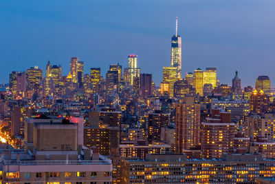 Illuminated buildings in city at night