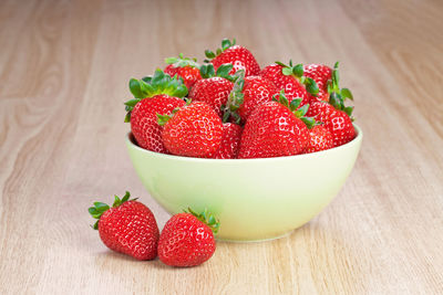 High angle view of strawberries on table