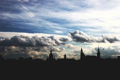 Built structure against cloudy sky