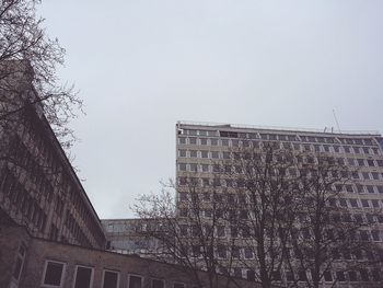 Low angle view of buildings against clear sky