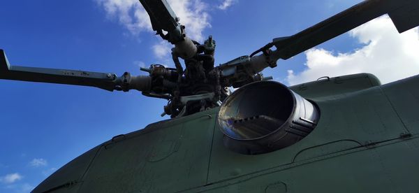 Low angle view of airplane against sky