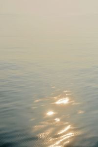 Scenic view of sea against sky at sunset