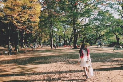 People walking in park