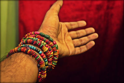 Close-up of human hand with bracelets