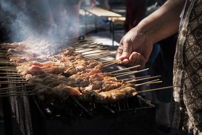 Close-up of meat on barbecue grill