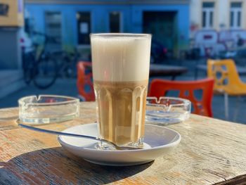 Close-up of coffee served on table at cafe