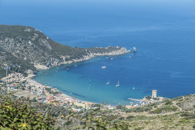 High angle view of sea and cityscape