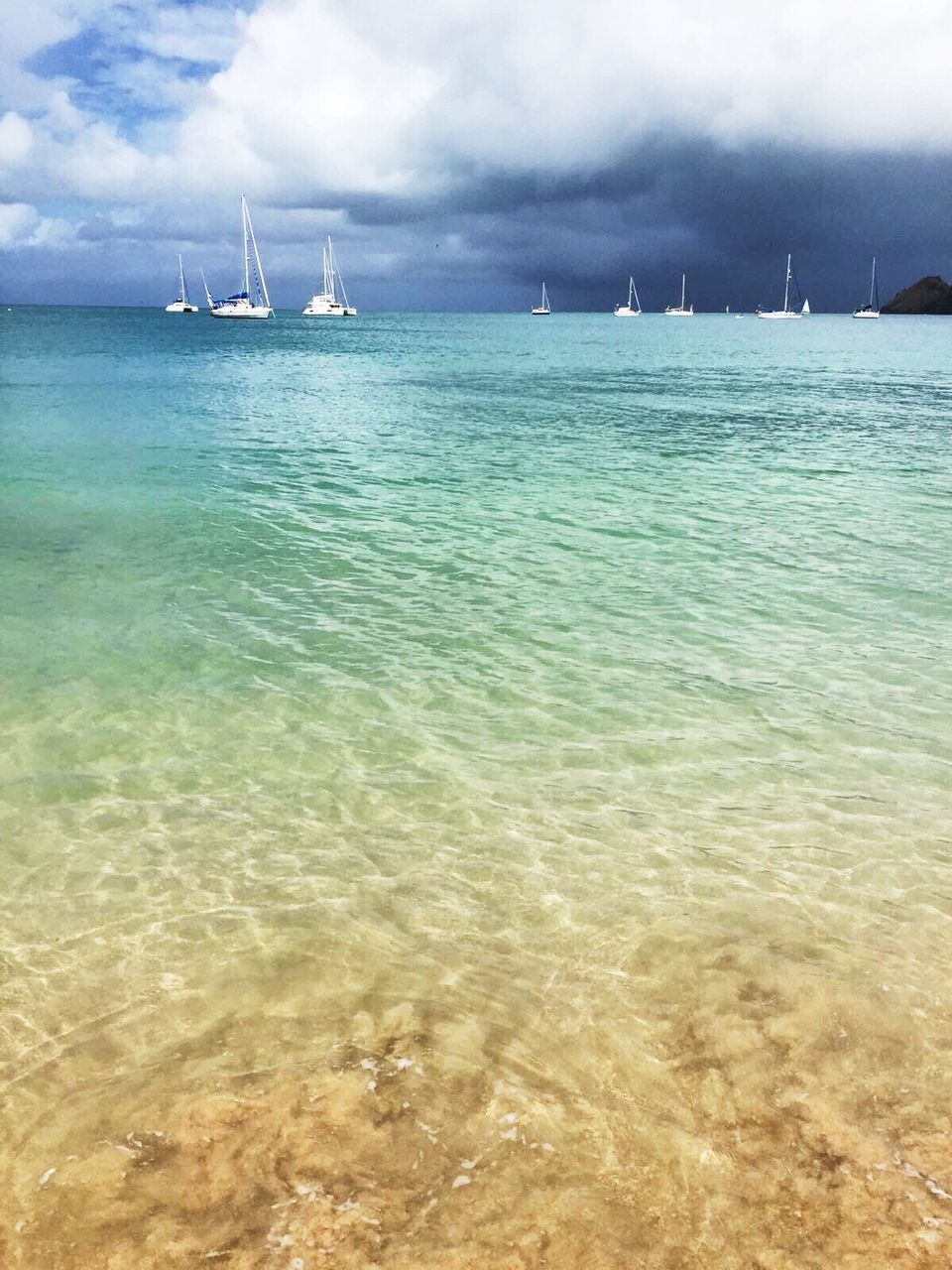 sea, water, sky, nautical vessel, horizon over water, beach, mode of transport, cloud - sky, transportation, outdoors, beauty in nature, tranquility, tranquil scene, nature, scenics, sand, day, no people, sailing ship, yacht