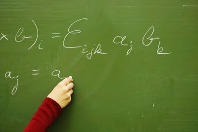 Math formulas, math class, math lessons, teaching mathematics, calculation on blackboard