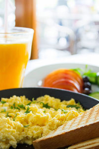 Close-up of breakfast served on table