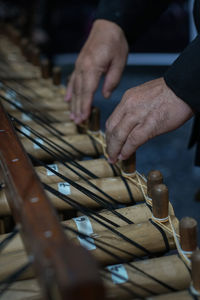 Is a musical angklung instrument from west java, indonesia made of a varying number of angklung 