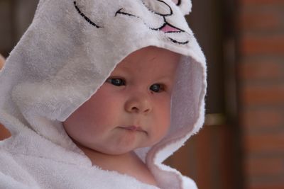 Portrait of cute baby boy at home