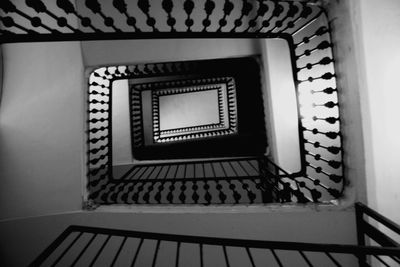 Directly below shot of spiral staircase of building