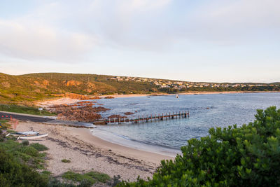 Scenic view of bay against sky