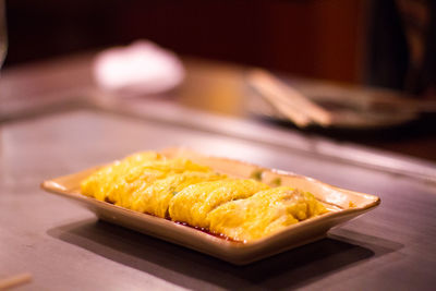 Close-up of food served on table