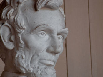 Close-up of statue against wall