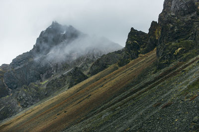 Scenic view of rocky mountains against sky