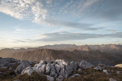 Idyllic shot of rocky mountains against sky during sunrise