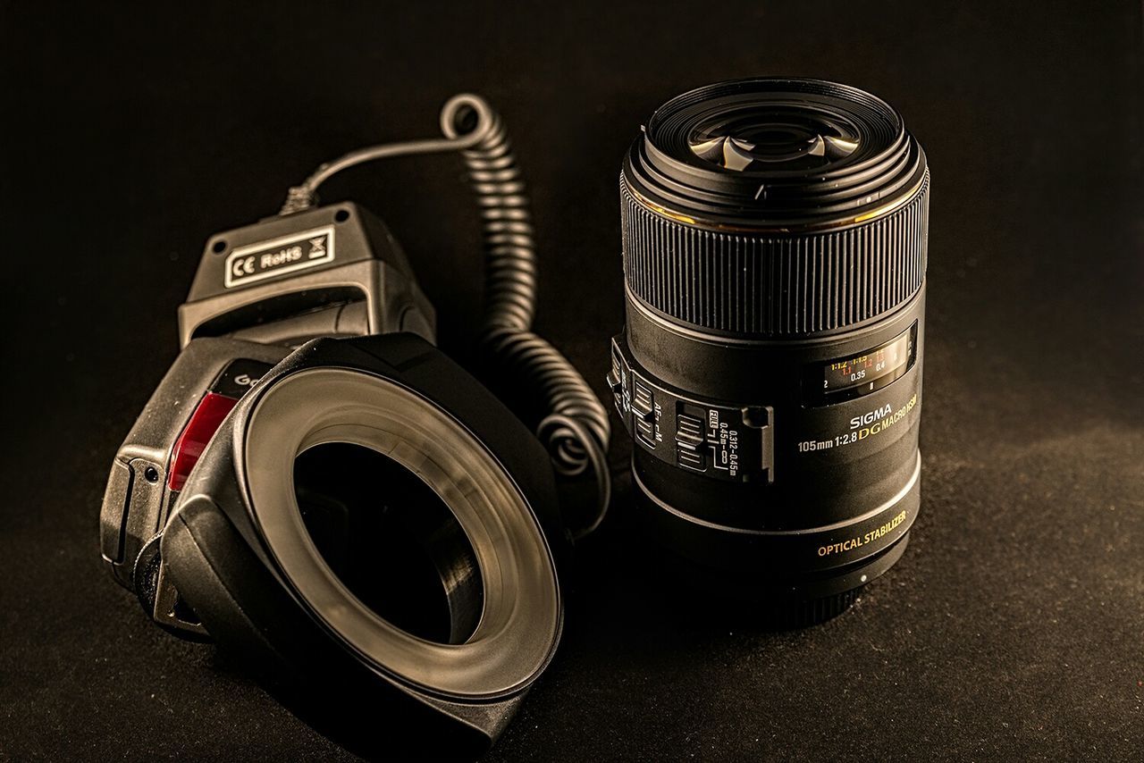 close-up, still life, technology, indoors, single object, retro styled, no people, metal, old-fashioned, number, focus on foreground, circle, black color, selective focus, man made object, communication, studio shot, antique, equipment, music