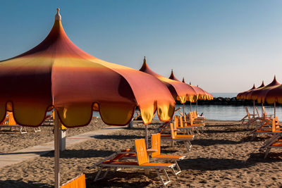 Panoramic view of beach against clear sky