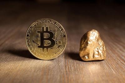 Close-up of coins on table