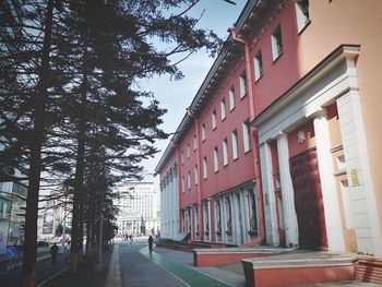 Street amidst buildings against sky