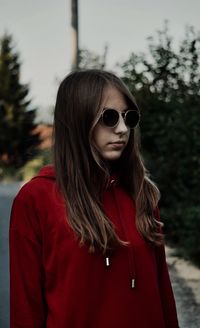 Portrait of young woman in sunglasses