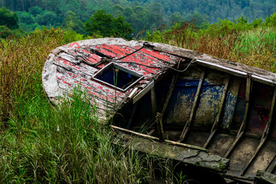 Old abandoned truck on field