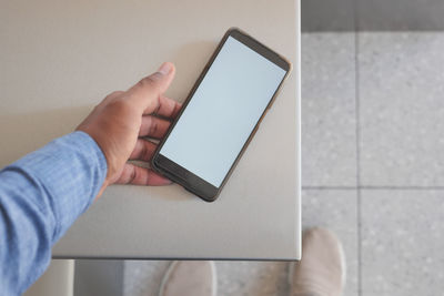 Cropped hands using digital tablet