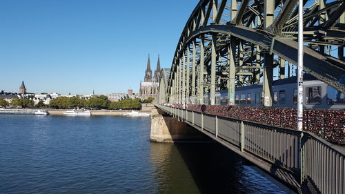 View of bridge over river in city