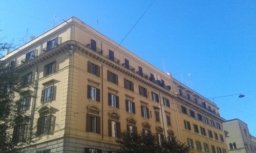 Low angle view of building against blue sky