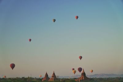 Low angle view of hot air balloons against sky