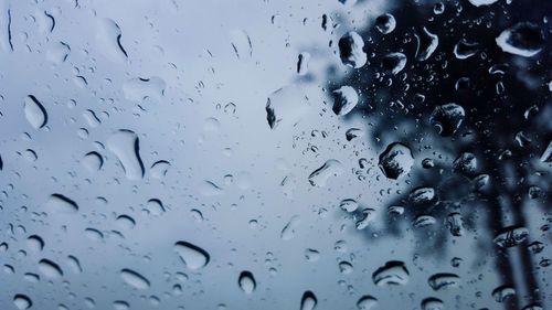 Close-up of water drops on glass