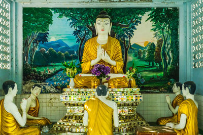 Statue of buddha outside building