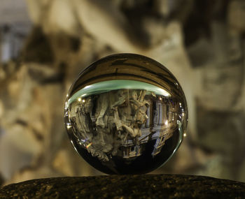 Close-up of ball on glass