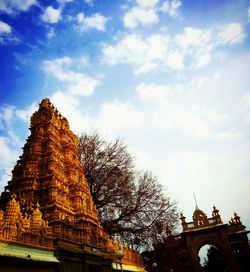 View of temple against cloudy sky