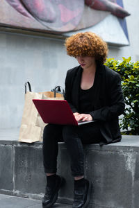 Young woman using digital tablet