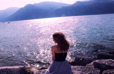 Rear view of woman looking at sea