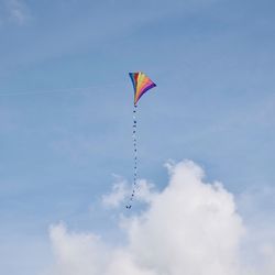 Low angle view of airshow against sky