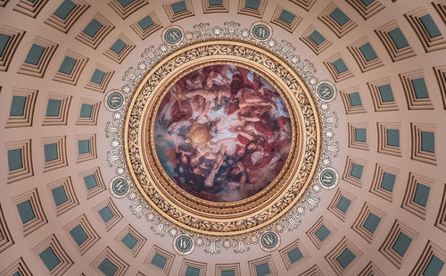 Directly below shot of ornate ceiling