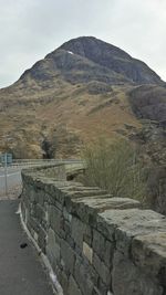 Landscape with mountain range in background