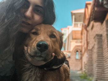 Portrait of man with dog