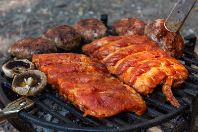 Close-up of meat on barbecue grill