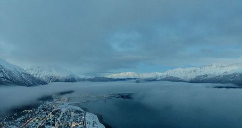 Scenic view of snowcapped mountains against sky