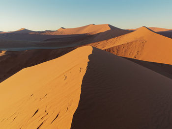 Scenic view of desert against clear sky